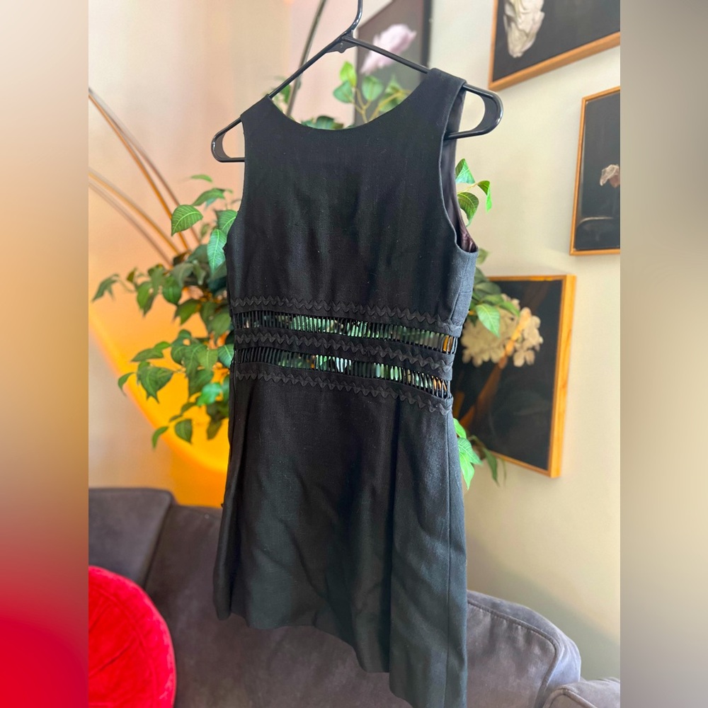 Young New Yorker Shop Lord & Taylor vintage black linen mini dress.
Size: N/A.